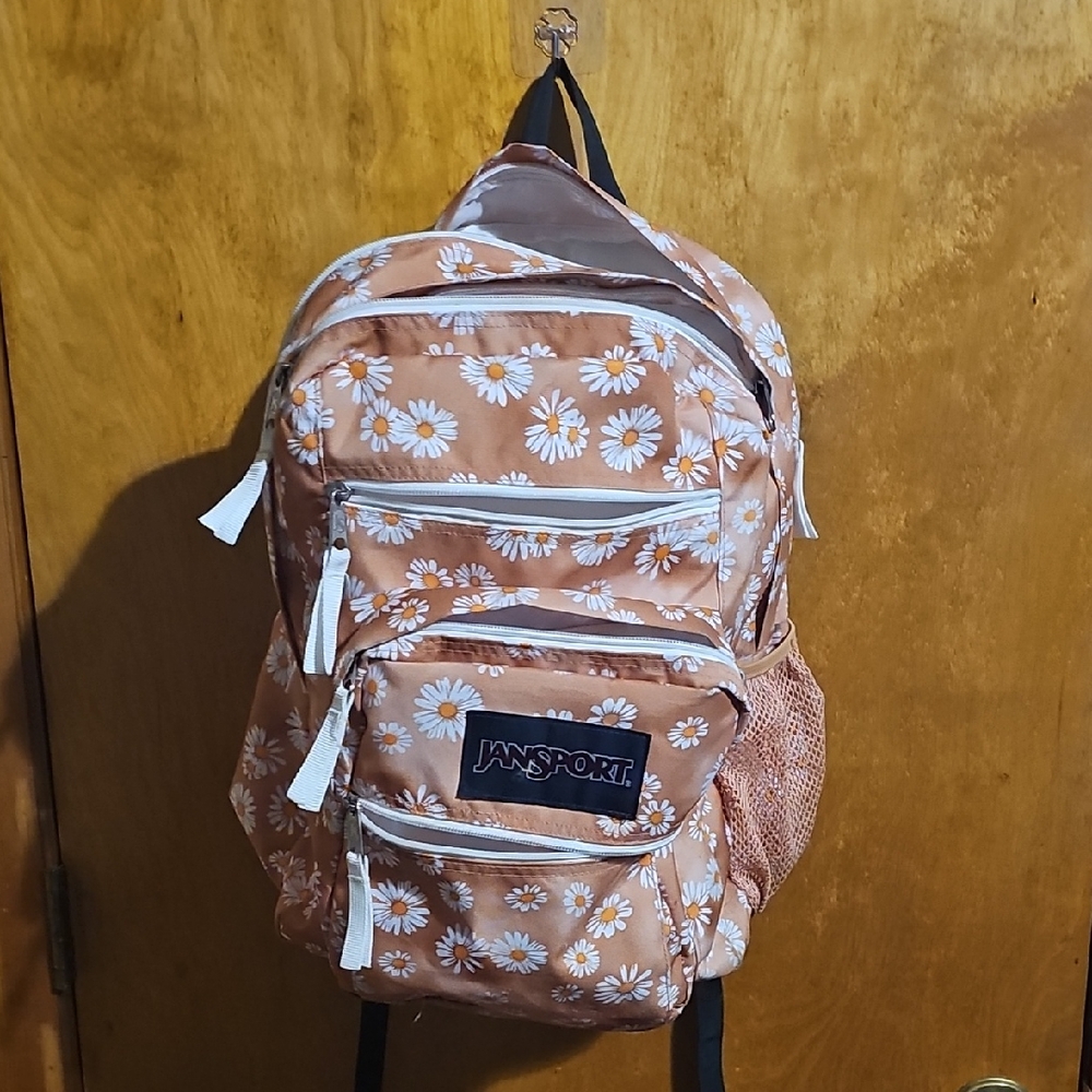 Jansport Daisy Print Backpack in Orange and White